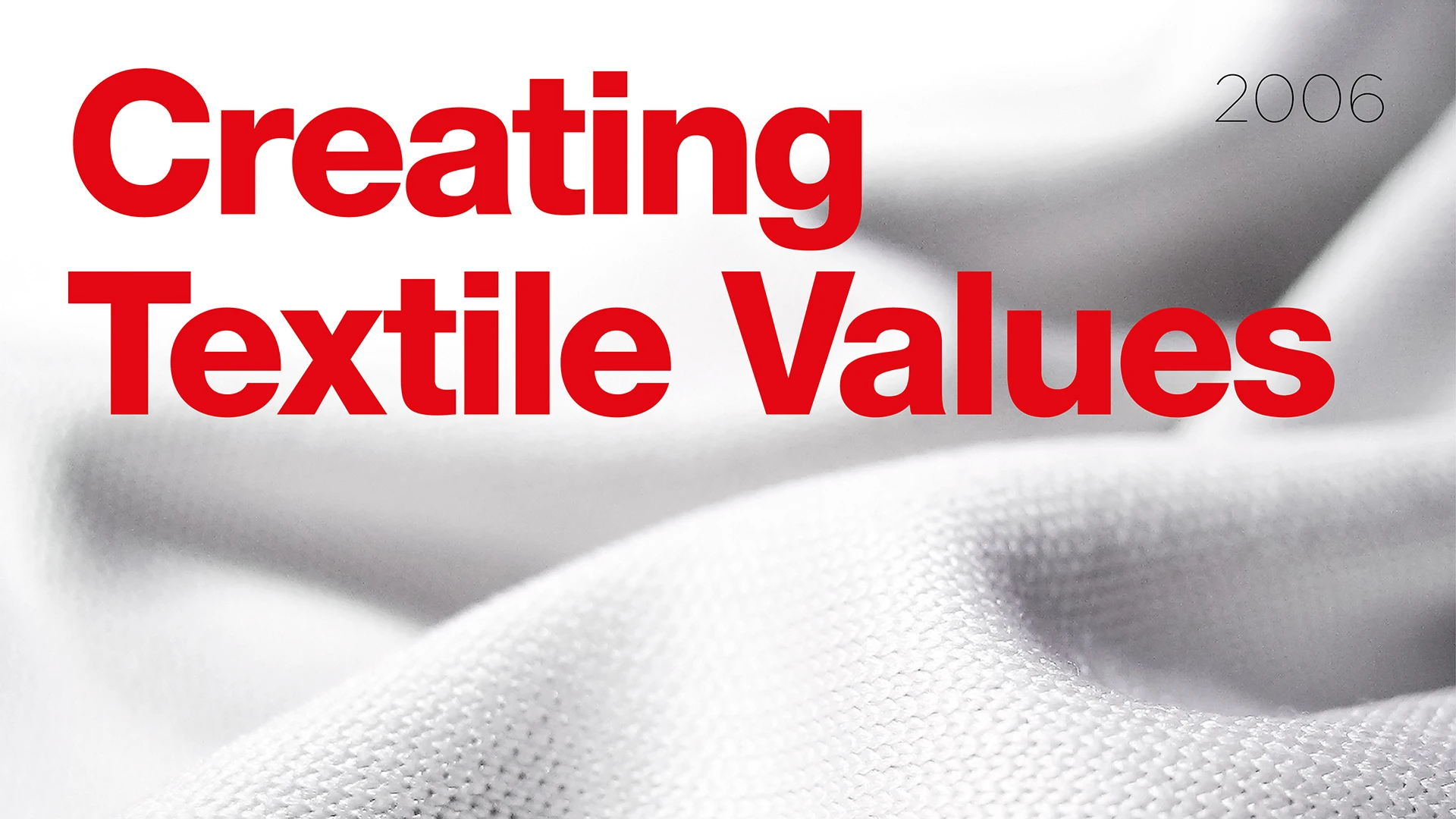 Kampagnenmotiv Creating Textile Values, roter Text auf weißem Textil