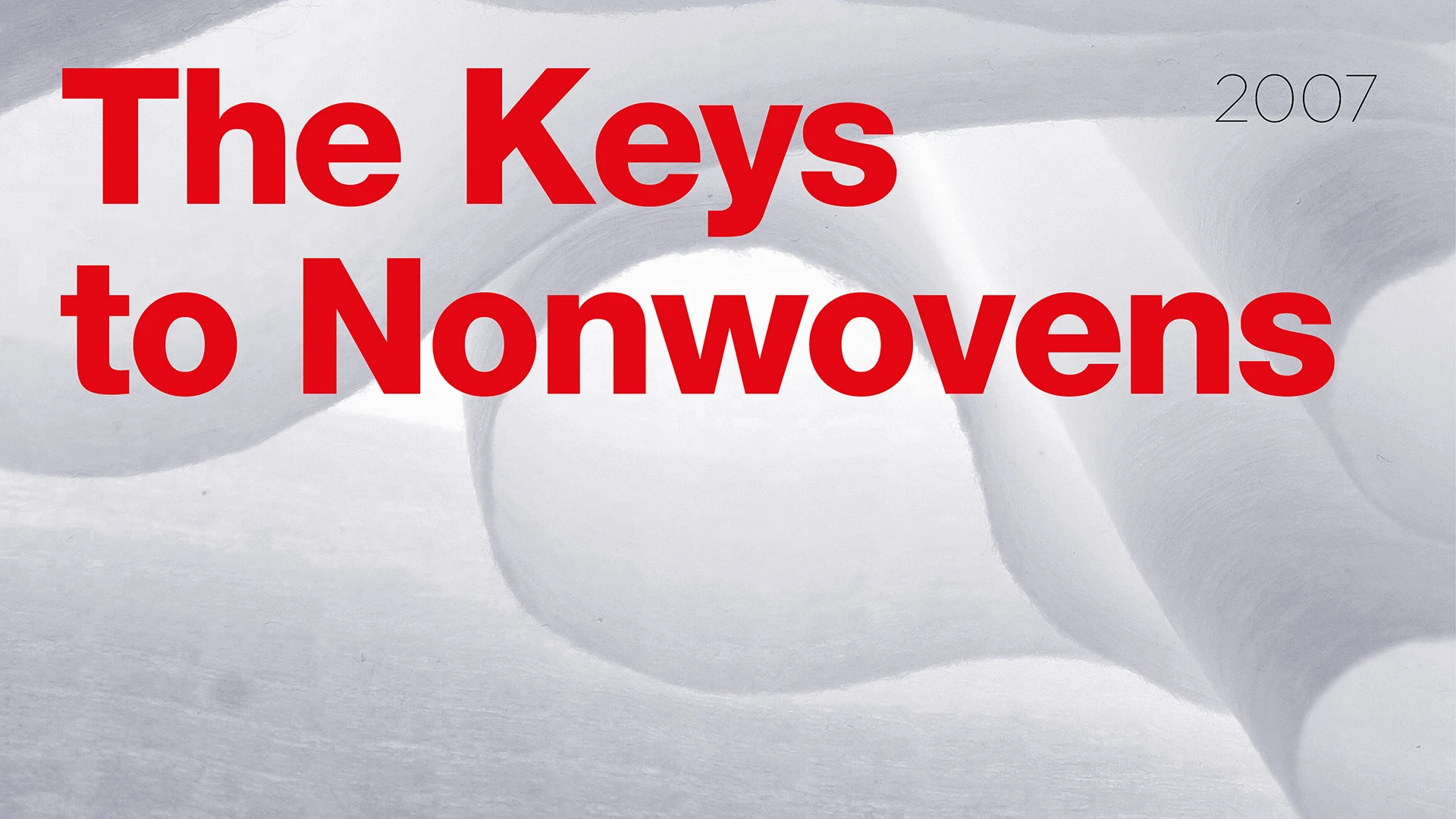 Kampagnenmotiv The Keys to Nonwovens, roter Text auf weißem Vliesstoff